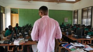 The Future Leaders of Agriculture: A man stands in front of a full classroom.